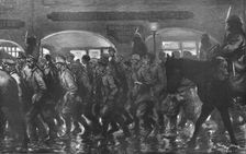 'Arrivee a remiremont des prisonniers de l'Hartmannswillerkopf, le soir du 24 decembre 1915. Creator: Georges Bertin Scott