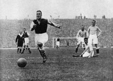 Arsenal footballer Alex James passes three Manchester City players, c1929-c1937. Artist: Graphic Photo Union