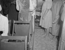 As in Moses time, members of the St. Martin's Spiritual Church remove...Washington, D.C., 1942. Creator: Gordon Parks