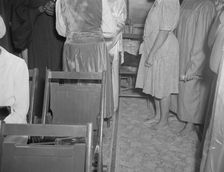 As in Moses time, members of the St. Martin's Spiritual Church remove...Washington, D.C., 1942. Creator: Gordon Parks
