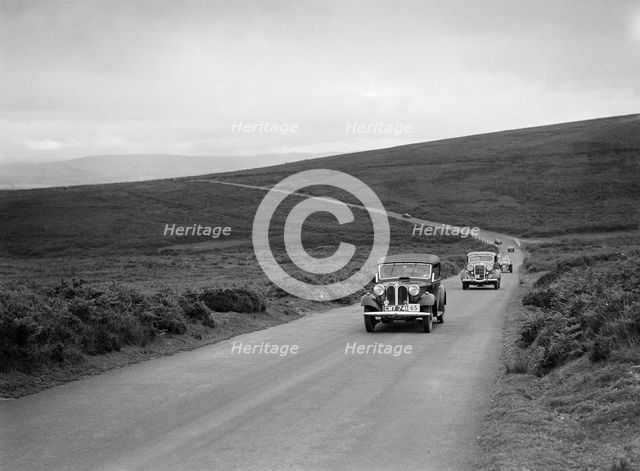 AS Whiddington's Frazer-Nash BMW ahead of RE Wright's Ford V8 at the MCC Torquay Rally, July 1937. Artist: Bill Brunell.