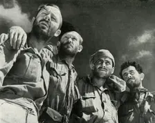 As the Germans thrust at Alamein, these four men walked into the British lines c1942-1943, (1945) Creator: Unknown