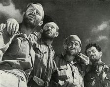 As the Germans thrust at Alamein, these four men walked into the British lines c1942-1943, (1945) Creator: Unknown