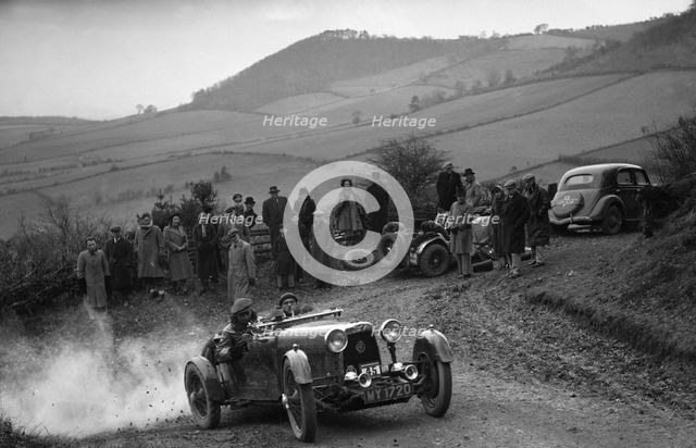 Aston Martin 2-seater of JD Keightley competing in the MG Car Club Midland Centre Trial, 1938. Artist: Bill Brunell.