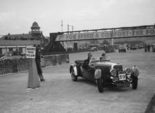 Aston Martin 4-seat open tourer competing in the JCC Rally, Brooklands, Surrey, 1939. Artist: Bill Brunell