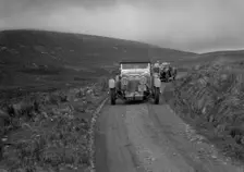 Aston Martin of Mrs JW Rutherford competing in the RSAC Scottish Rally, 1934. Artist: Bill Brunell