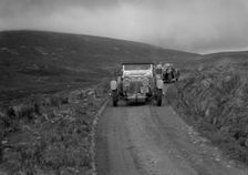 Aston Martin of Mrs JW Rutherford competing in the RSAC Scottish Rally, 1934. Artist: Bill Brunell