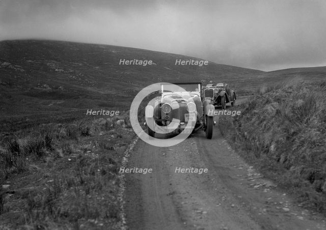 Aston Martin of Mrs JW Rutherford competing in the RSAC Scottish Rally, 1934. Artist: Bill Brunell.