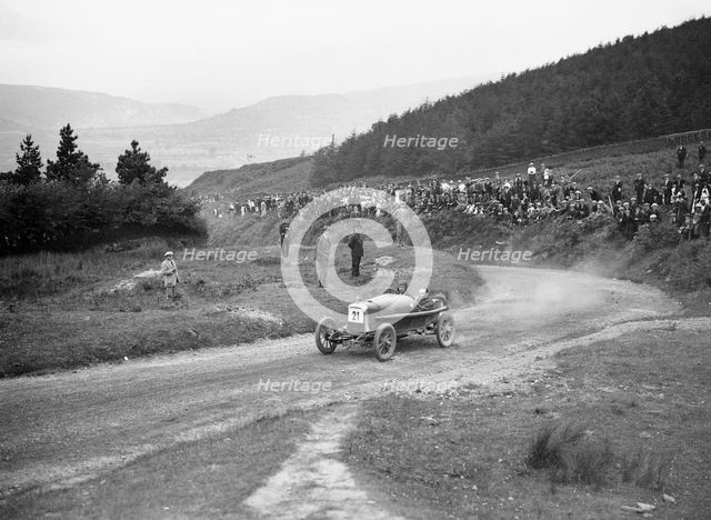 Aston Martin Bunny of Frank B Halford competing in the Caerphilly Hillclimb, Wales, 1923. Artist: Bill Brunell.