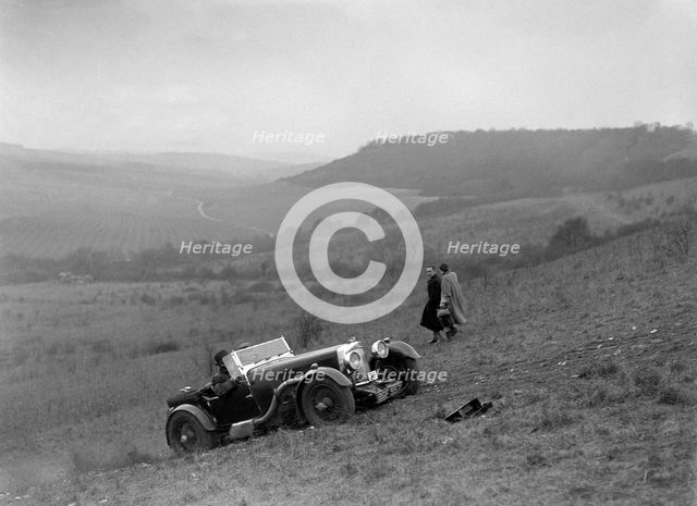Aston Martin competing in the London Motor Club Coventry Cup Trial, Knatts Hill, Kent, 1938. Artist: Bill Brunell.