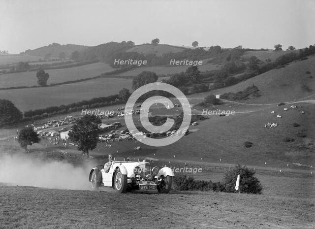 Aston Martin competing in the Singer CC Rushmere Hill Climb, Shropshire 1935. Artist: Bill Brunell.