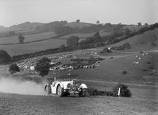 Aston Martin competing in the Singer CC Rushmere Hill Climb, Shropshire 1935. Artist: Bill Brunell