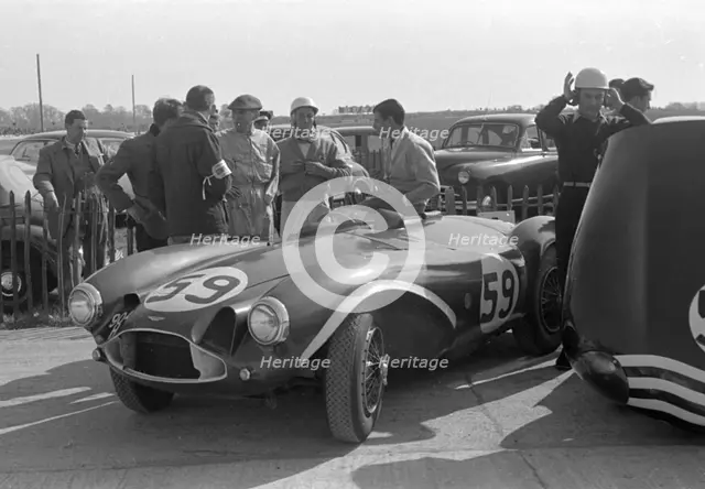 Aston Martin DB3S, Stirling Moss in paddock at Goodwood International Sports Car Race 1956. Creator: Unknown.