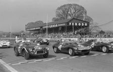 Aston Martin DB3S, Stirling Moss on grid at Goodwood International Sports Car Race 1956. Creator: Unknown
