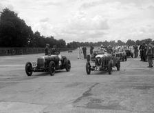 Aston Martins, Salmson and MG at the start of the LCC Relay GP, Brooklands, 25 July 1931. Artist: Bill Brunell