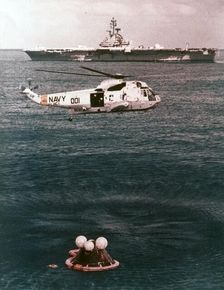 Astronauts being recovered from the sea, Apollo 16 mission, 27 April 1972. Creator: NASA