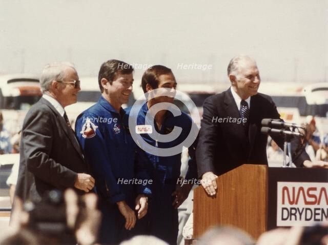 Astronauts John Young and Robert Crippen after landing, April 1981. Creator: NASA.