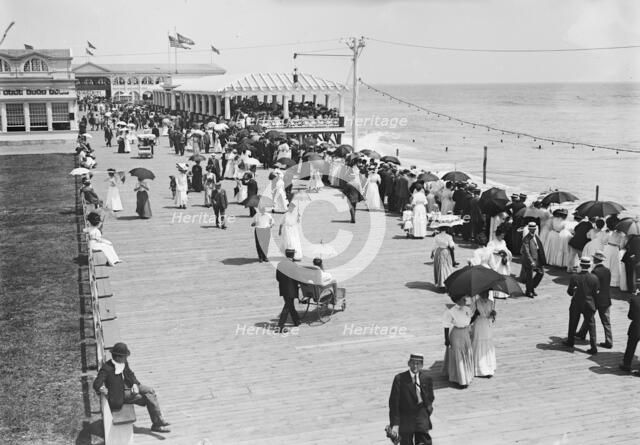 Asbury - Board walk & esplanade review, 1911. Creator: Bain News Service.