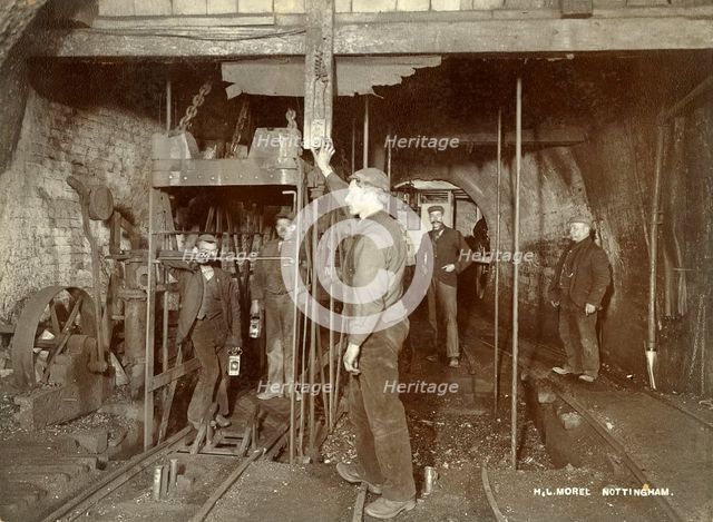 Ascending in the pit cage, Clifton Colliery, Nottinghamshire, c1895. Creator: HL Morel.