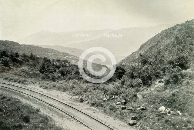'Ascending the Mexican Cordillera, or Eastern Sierra Madre: The Railway Is Seen In The Valley Far Be Creator: Unknown.