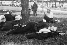 Asleep in Battery Park on hot day, between c1910 and c1915. Creator: Bain News Service