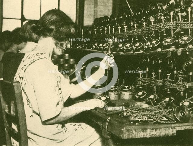 'Assembling the New Automatic Telephones Ready for Distribution to Subscribers', c1930. Creator: Unknown.
