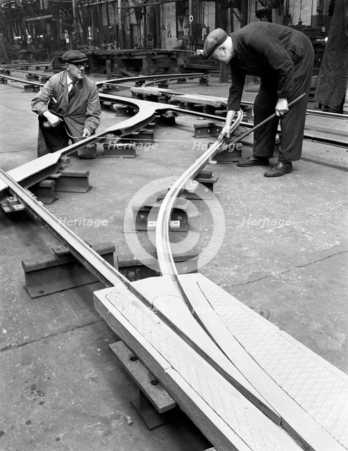 Assembling trackwork in an ICI factory, Sheffield, South Yorkshire, 1963.  Artist: Michael Walters