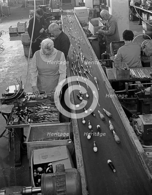 Assembling chisels and screwdrivers, Footprint Tools, Sheffield, 1968. Creator: Michael Walters.