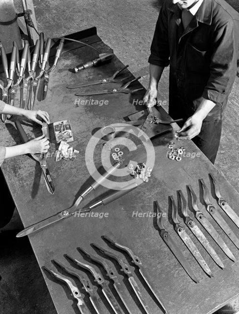 Assembling garden shears, Sheffield, South Yorkshire, 1965. Creator: Michael Walters.