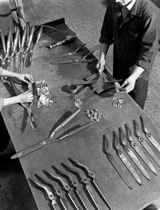 Assembling garden shears, Sheffield, South Yorkshire, 1965. Creator: Michael Walters