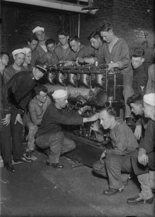 Assembling main engine, between c1915 and c1920. Creator: Bain News Service