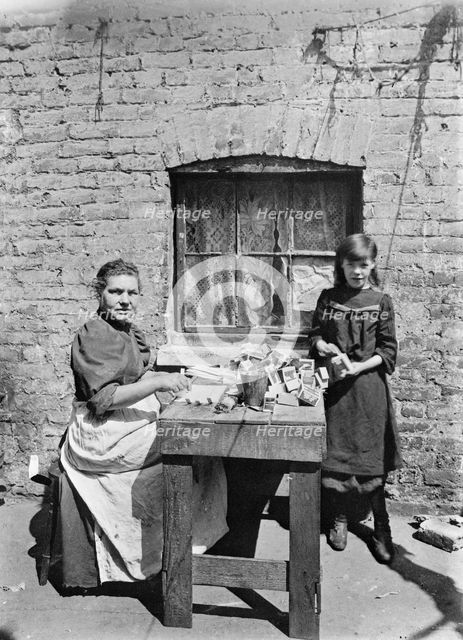 Assembling match boxes at home, 1900s. Creator: John Galt.