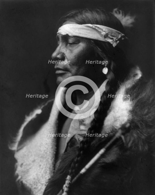 Assiniboin Boy-Atsina, c1908. Creator: Edward Sheriff Curtis.