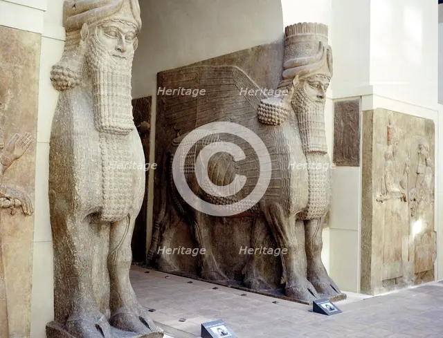 Assyrian sculptures of human-headed winged bulls at the palace gateway, Khorsabad, c8th century BC. Artist: Unknown