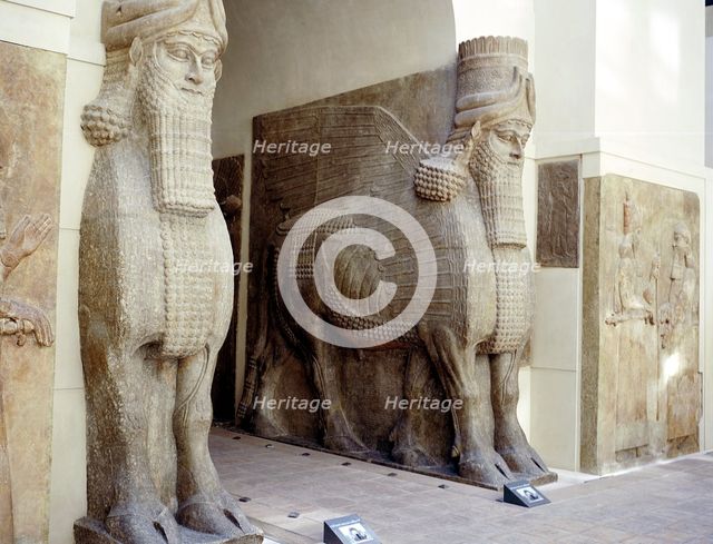 Assyrian sculptures of human-headed winged bulls at the palace gateway, Khorsabad, c8th century BC. Artist: Unknown