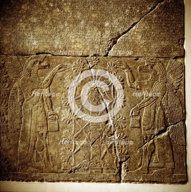 Assyrian relief of a Sacred tree flanked by two winged genies. Artist: Unknown