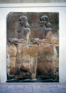Assyrian relief of two servants, Palace of Sargon II, Khorsabad, c8th century BC