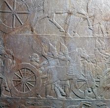 Assyrian relief showing Assyrian chariot at battle of the river Ulai, 7th century