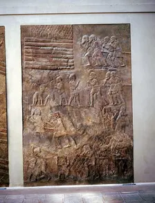 Assyrian relief showing transport of timber by land, Khorsabad, c8th century BC