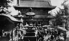 'At Asakusa, the great temple of Tokyo, the fortune-telling business is brisk c1900, (1921). Artist: Julian Leonard Street