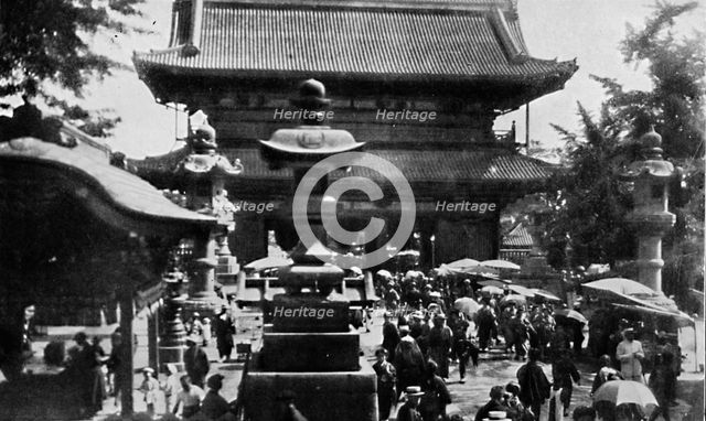 ''At Asakusa, the great temple of Tokyo, the fortune-telling business is brisk', c1900, (1921).  Artist: Julian Leonard Street.