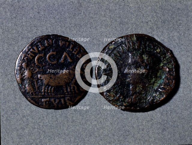 At left a coin with the legend 'Scipione er Montano II vir CCA', at right the front with the word…