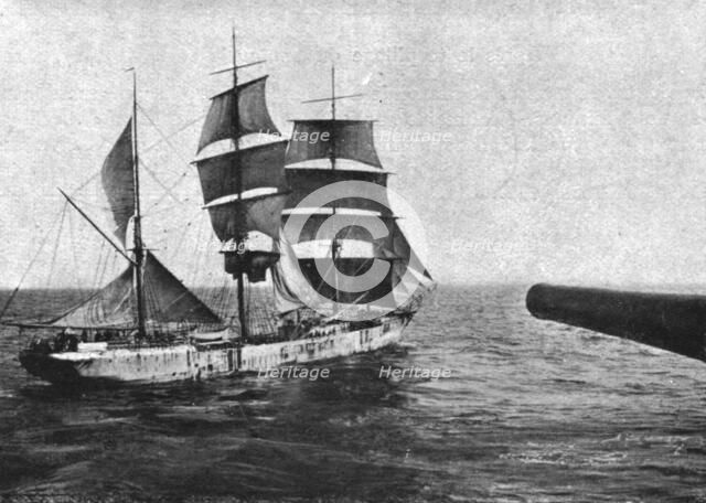 At sea; A sailboat is boarding: during the whole visit, the ship remains under the cannon..., 1917. Creator: Unknown.