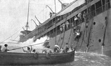 At Sea; After the "Sontay" was torpedoed on April 16, 1917, at noon: the last passenger..., 1917. Creator: Unknown