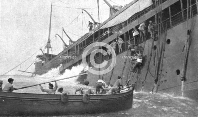 At Sea; After the "Sontay" was torpedoed on April 16, 1917, at noon: the last passenger..., 1917. Creator: Unknown.