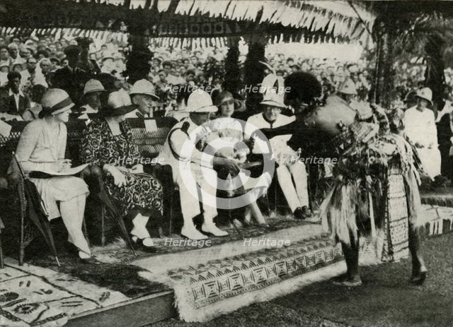 'At Suva, Fiji. Presenting a "Tabua" (Tooth of the Sperm Whale) ...1927', 1937. Creator: Unknown.