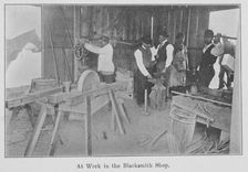 At work in the Blacksmith Shop., 1903. Creator: Unknown