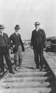 At the new railroad left to right are: Mr. Edes, Frank G. Carpenter,..., between c1900 and 1916. Creator: Unknown