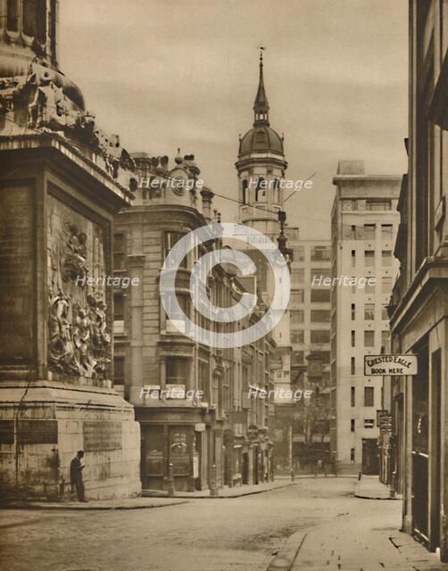'At the Base of the Monument of Fish Street Hill', c1935. Creator: Donald McLeish.