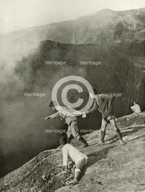 'At the Crater's Brink, Aso-San', 1910. Creator: Herbert Ponting.